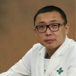 丁以群